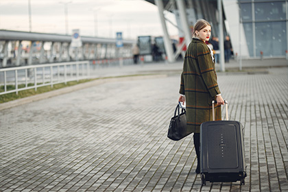 Woman is Going With Luggage